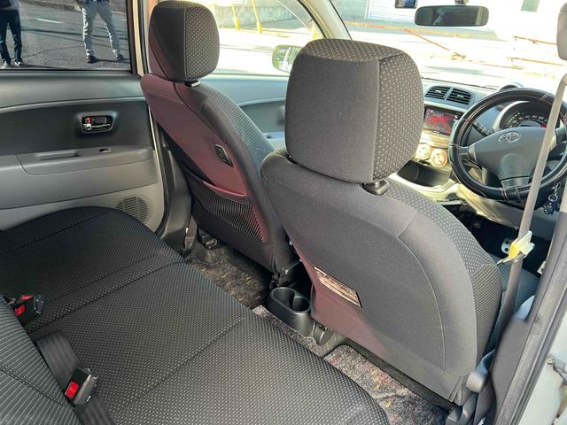 パッソ レーシー アルミホイール キーレスエントリー 電動格納ミラー 衝突安全ボディ ABS CD DVD再生 エアコン(24枚目)