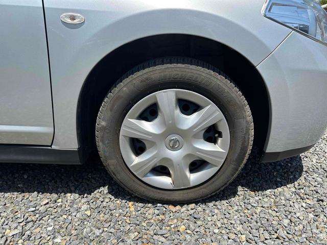 ティーダ １５Ｍ　スマートキー　ＣＶＴ　盗難防止システム　衝突安全ボディ　記録簿　ＡＢＳ　ＣＤ　ミュージックプレイヤー接続可　エアコン　パワーステアリング　パワーウィンドウ（12枚目）