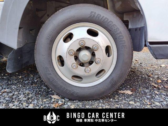 アトラストラック スーパーローＤＸ　１０尺　パネルバン　シャッター式後扉　荷室証明有　リヤゲートチェーン　キーレスエントリー　リヤトラフィックモニター　スタッドレスタイヤ６本付　４速ＡＴガソリン車（61枚目）