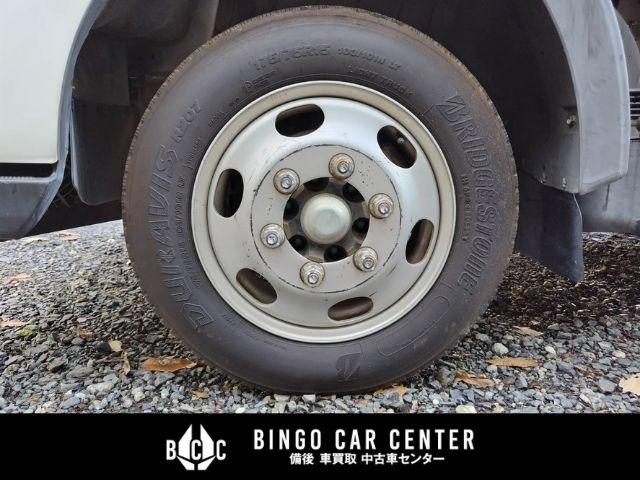 アトラストラック スーパーローＤＸ　１０尺　パネルバン　シャッター式後扉　荷室証明有　リヤゲートチェーン　キーレスエントリー　リヤトラフィックモニター　スタッドレスタイヤ６本付　４速ＡＴガソリン車（62枚目）