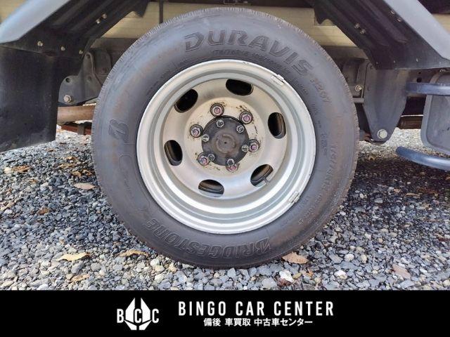 アトラストラック スーパーローＤＸ　１０尺　パネルバン　シャッター式後扉　荷室証明有　リヤゲートチェーン　キーレスエントリー　リヤトラフィックモニター　スタッドレスタイヤ６本付　４速ＡＴガソリン車（63枚目）