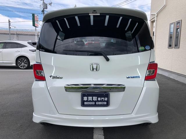 フリードスパイクハイブリッド ジャストセレクション　５人乗り／ワンオーナー／禁煙車／ＥＴＣ／ドラレコ／純正ナビ／バックカメラ／Ｂｌｕｅｔｏｏｔｈ／ＴＶ／ＤＶＤ／ＣＤ／両側パワースライドドア／ＳＤ／オートライト／オートエアコン／電動格納ミラー／予備キー（16枚目）