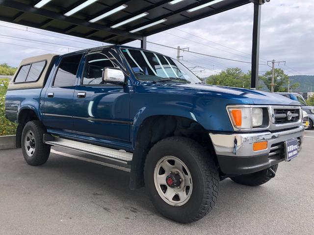 ハイラックスピックアップ ダブルキャブ SSR 4WD/ディーゼル/5MT/4ドア/5人乗り/ETC/エアコン/パワステ/15インチアルミホイール/社外シフトノブ/ドアバイザー/記録簿/取扱説明書(8枚目)