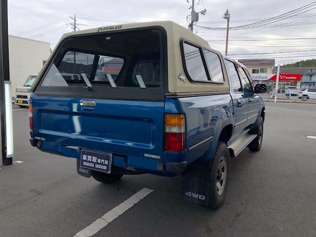 ハイラックスピックアップ ダブルキャブ SSR 4WD/ディーゼル/5MT/4ドア/5人乗り/ETC/エアコン/パワステ/15インチアルミホイール/社外シフトノブ/ドアバイザー/記録簿/取扱説明書(19枚目)