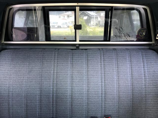 ハイラックスピックアップ ダブルキャブ SSR 4WD/ディーゼル/5MT/4ドア/5人乗り/ETC/エアコン/パワステ/15インチアルミホイール/社外シフトノブ/ドアバイザー/記録簿/取扱説明書(41枚目)