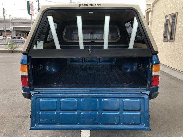 ハイラックスピックアップ ダブルキャブ SSR 4WD/ディーゼル/5MT/4ドア/5人乗り/ETC/エアコン/パワステ/15インチアルミホイール/社外シフトノブ/ドアバイザー/記録簿/取扱説明書(53枚目)