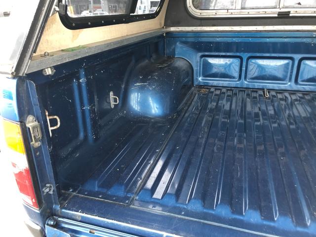 ハイラックスピックアップ ダブルキャブ SSR 4WD/ディーゼル/5MT/4ドア/5人乗り/ETC/エアコン/パワステ/15インチアルミホイール/社外シフトノブ/ドアバイザー/記録簿/取扱説明書(55枚目)