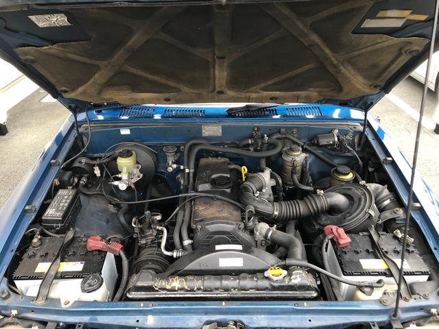 ハイラックスピックアップ ダブルキャブ SSR 4WD/ディーゼル/5MT/4ドア/5人乗り/ETC/エアコン/パワステ/15インチアルミホイール/社外シフトノブ/ドアバイザー/記録簿/取扱説明書(75枚目)