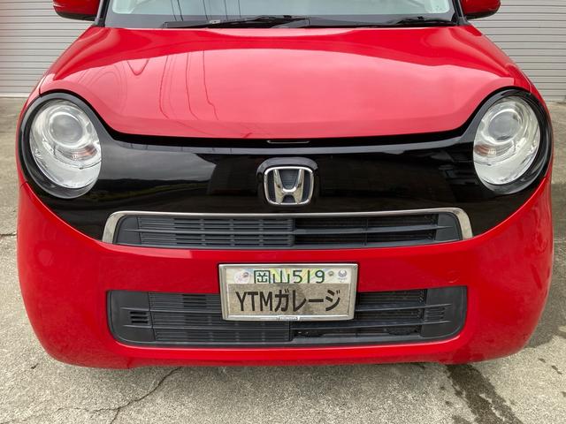 Ｎ－ＯＮＥ Ｇ・Ｌパッケージ　車検Ｒ９年９月まで　禁煙車　純正ナビ　バックカメラ　テレビ　ＤＶＤ　ＵＳＢ　ステアリングリモコン　ＨＩＤオートライト　センターマフラー　１５インチアルミホイール　ミラノレッド　室内ルームクリーニング済（5枚目）