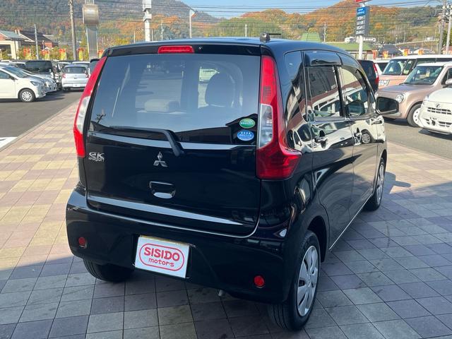 eKワゴン E 社外ナビ 地デジ シートヒーター 格納ミラー キーレスエントリー 横滑り防止 ベンチシート 衝突安全ボディー Wエアバック ABS ヘッドライトレべライザー 禁煙車(6枚目)