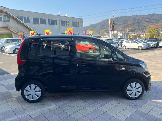 eKワゴン E 社外ナビ 地デジ シートヒーター 格納ミラー キーレスエントリー 横滑り防止 ベンチシート 衝突安全ボディー Wエアバック ABS ヘッドライトレべライザー 禁煙車(19枚目)