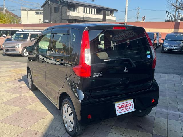 eKワゴン E 社外ナビ 地デジ シートヒーター 格納ミラー キーレスエントリー 横滑り防止 ベンチシート 衝突安全ボディー Wエアバック ABS ヘッドライトレべライザー 禁煙車(25枚目)