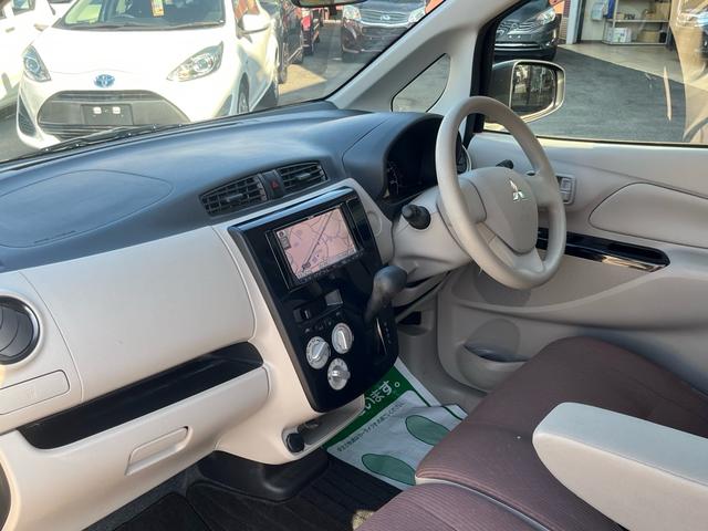 eKワゴン E 社外ナビ 地デジ シートヒーター 格納ミラー キーレスエントリー 横滑り防止 ベンチシート 衝突安全ボディー Wエアバック ABS ヘッドライトレべライザー 禁煙車(26枚目)