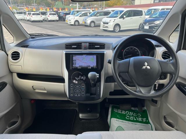 eKワゴン M 社外ナビ 地デジ キーレスエントリー タッチパネルオートエアコン 格納ミラー アイドリングストップ ETC ベンチシート 衝突安全ボディー Wエアバック ABS ヘッドライトレべライザー 禁煙車(8枚目)