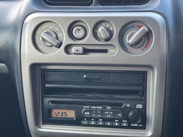 テリオスキッド カスタムL 純正CDステレオ ETC 格納ミラー フォグランプ 背面タイヤ 純正アルミ リアスポイラー 衝突安全ボディー Wエアバック ヘッドライトレべライザー(9枚目)