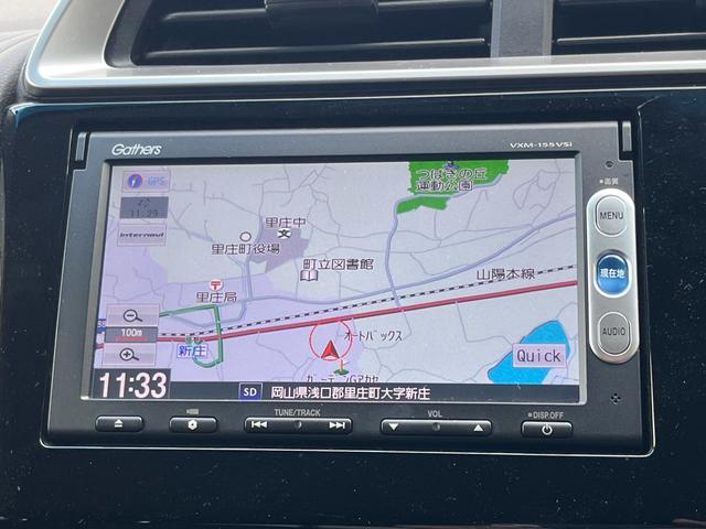 フィットハイブリッド Ｌパッケージ　ナビ　地デジ　Ｂｌｕｅｔｏｏｈ　バックモニター　スマートキー　ＥＴＣ　ハーフレザーシート　ＬＥＤライト　クルーズコントロール　格納ミラー　オートライト　横滑り防止　アイドリングストップ　ＡＢＳ　禁煙車（9枚目）