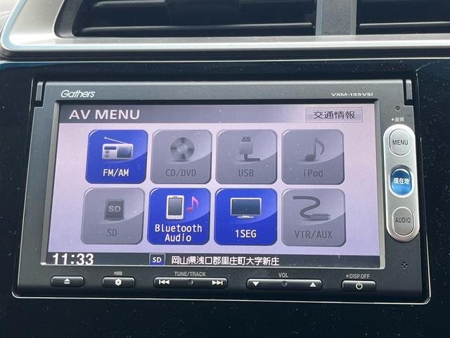 フィットハイブリッド Ｌパッケージ　ナビ　地デジ　Ｂｌｕｅｔｏｏｈ　バックモニター　スマートキー　ＥＴＣ　ハーフレザーシート　ＬＥＤライト　クルーズコントロール　格納ミラー　オートライト　横滑り防止　アイドリングストップ　ＡＢＳ　禁煙車（10枚目）