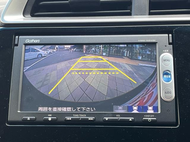 フィットハイブリッド Ｌパッケージ　ナビ　地デジ　Ｂｌｕｅｔｏｏｈ　バックモニター　スマートキー　ＥＴＣ　ハーフレザーシート　ＬＥＤライト　クルーズコントロール　格納ミラー　オートライト　横滑り防止　アイドリングストップ　ＡＢＳ　禁煙車（13枚目）