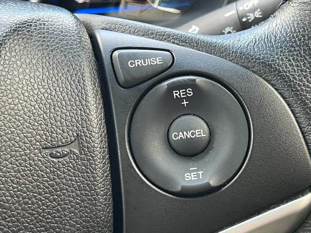 フィットハイブリッド Ｌパッケージ　ナビ　地デジ　Ｂｌｕｅｔｏｏｈ　バックモニター　スマートキー　ＥＴＣ　ハーフレザーシート　ＬＥＤライト　クルーズコントロール　格納ミラー　オートライト　横滑り防止　アイドリングストップ　ＡＢＳ　禁煙車（21枚目）