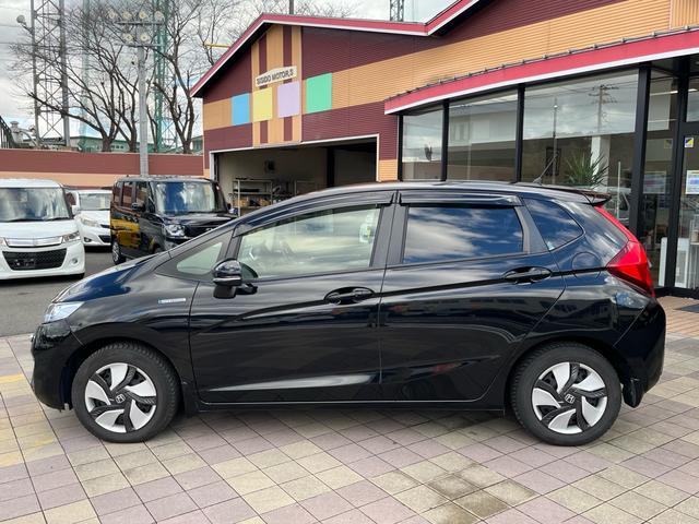 フィットハイブリッド Ｌパッケージ　ナビ　地デジ　Ｂｌｕｅｔｏｏｈ　バックモニター　スマートキー　ＥＴＣ　ハーフレザーシート　ＬＥＤライト　クルーズコントロール　格納ミラー　オートライト　横滑り防止　アイドリングストップ　ＡＢＳ　禁煙車（33枚目）