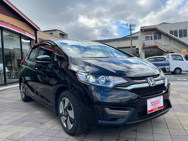 フィットハイブリッド Ｌパッケージ　ナビ　地デジ　Ｂｌｕｅｔｏｏｈ　バックモニター　スマートキー　ＥＴＣ　ハーフレザーシート　ＬＥＤライト　クルーズコントロール　格納ミラー　オートライト　横滑り防止　アイドリングストップ　ＡＢＳ　禁煙車（45枚目）