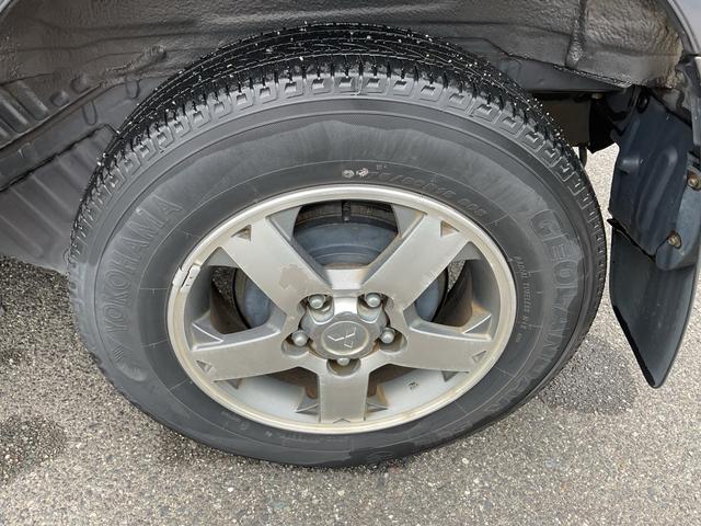 パジェロミニ リミテッドエディションＶＲ　４速ＡＴ　ターボ　切替式４ＷＤ　キーレスエントリー　背面タイヤ　エアコン　パワーステアリング　パワーウィンドウ　ＡＢＳ　衝突安全ボディ　純正アルミ　Ｗエアバッグ（64枚目）