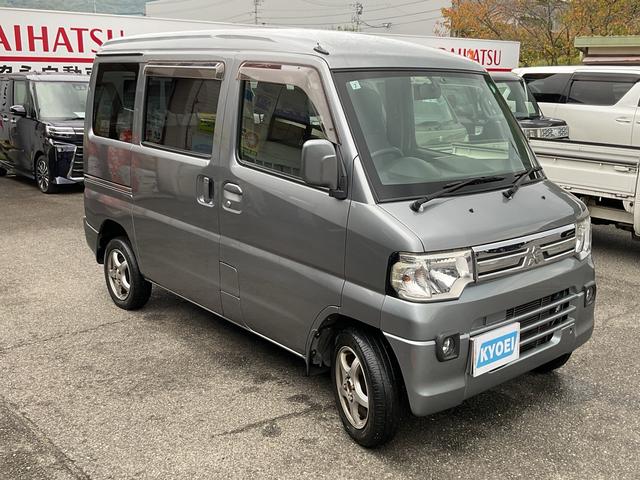 ミニキャブバン ブラボー　ターボ　４ＷＤ　４速ＡＴ　ハイルーフ　社外ナビ　ＴＶ　ＥＴＣ　エアコン　パワーステアリング　パワーウィンドウ　ＡＢＳ　フォグランプ　キーレスエントリー　Ｗエアバッグ（7枚目）