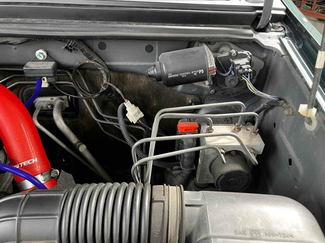 ジムニー ランドベンチャー　４ＷＤ　ターボ　５ＭＴ　リフトアップ　アピオマフラー　ワンオフヒッチメンバー　ドラレコ　ＥＴＣ　ナビ　バックカメラ　フルセグＴＶ　Ｂｌｕｅｔｏｏｔｈ　ＣＤ　ＤＶＤ　ＬＥＤヘッドライト　アルミホイール（53枚目）