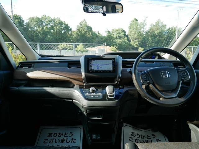 フリード＋ハイブリッド ハイブリッド・クロスターホンダセンシング　Ｈｏｎｄａ認定中古車　ナビ　Ｂｌｕｅｔｏｏｔｈｅ　バックカメラ　両側電動スライドドア　運転席＆助手席シートヒーター　ＥＴＣ　フロアマット　地デジフルセグ　両側電動スライドドア（6枚目）