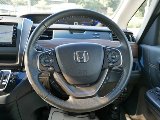 フリード＋ハイブリッド ハイブリッド・クロスターホンダセンシング　Ｈｏｎｄａ認定中古車　ナビ　Ｂｌｕｅｔｏｏｔｈｅ　バックカメラ　両側電動スライドドア　運転席＆助手席シートヒーター　ＥＴＣ　フロアマット　地デジフルセグ　両側電動スライドドア（12枚目）