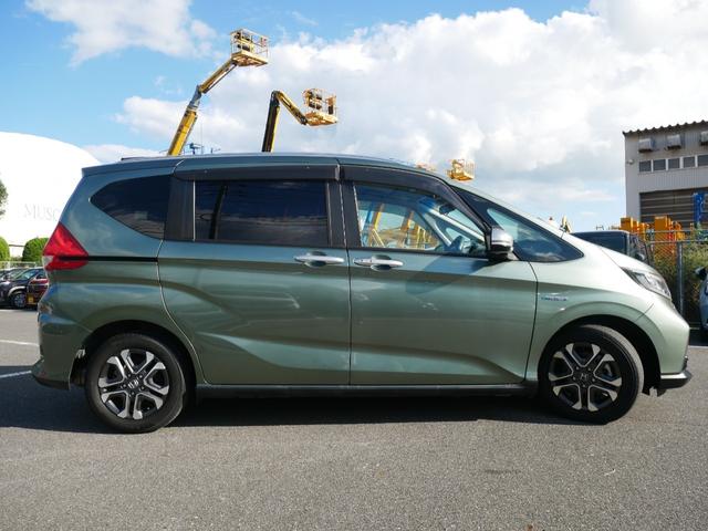 フリード＋ハイブリッド ハイブリッド・クロスターホンダセンシング　Ｈｏｎｄａ認定中古車　ナビ　Ｂｌｕｅｔｏｏｔｈｅ　バックカメラ　両側電動スライドドア　運転席＆助手席シートヒーター　ＥＴＣ　フロアマット　地デジフルセグ　両側電動スライドドア（37枚目）