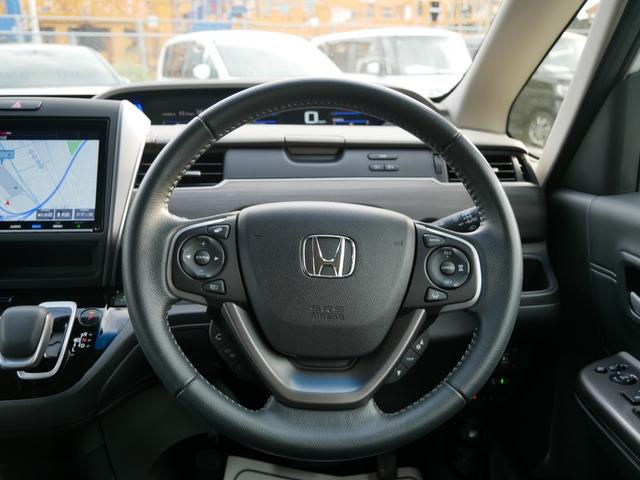 フリードハイブリッド ハイブリッド・Ｇホンダセンシング　Ｈｏｎｄａ認定中古車　ナビ　バックカメラ　運転席＆助手席シートヒーター　両側電動スライドドア　ＥＴＣ　前後ドライブレコーダー　フロアマット　軽減ブレーキ　ＥＣＯＮ（12枚目）
