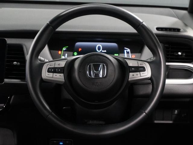 フィット ｅ：ＨＥＶホーム　バックカメラ　ドライブレコーダー　ＥＴＣ　障害物センサー　アダプティブクルーズコントロール　電動パーキングブレーキ　プッシュスタート　スマートキー　Ｂｌｕｅｔｏｏｔｈ　ＵＳＢ接続　オートライト（32枚目）