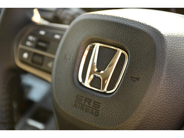 フリード ｅ：ＨＥＶエアー　ＥＸ　登録済未使用者・１１．４インチＨＯＮＤＡコネクトナビ／フルセグ／ＣＤ／ＤＶＤ・ＵＳＢ／ＨＤＭＩ入力・バックカメラ・前席シートヒーター・６人乗り・リアクーラー・ブラインドスポットモニター・１５インチＡＷ（47枚目）