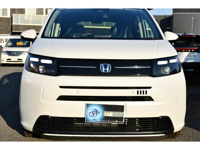 フリード ｅ：ＨＥＶエアー　ＥＸ　登録済未使用者・１１．４インチＨＯＮＤＡコネクトナビ／フルセグ／ＣＤ／ＤＶＤ・ＵＳＢ／ＨＤＭＩ入力・バックカメラ・前席シートヒーター・６人乗り・リアクーラー・ブラインドスポットモニター・１５インチＡＷ（55枚目）