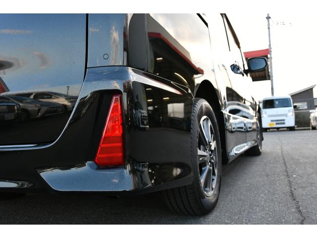 ヴォクシー ＺＳ　煌ＩＩＩ　イナズマスパーキングブラック・純正９インチナビ／フルセグ・１２インチ後席モニター・バックモニター・ハーフレザーシート・Ｗオートエアコン・両側パワースライドドア・ＬＥＤヘッドライト＆ＬＥＤＦＯＧ（11枚目）