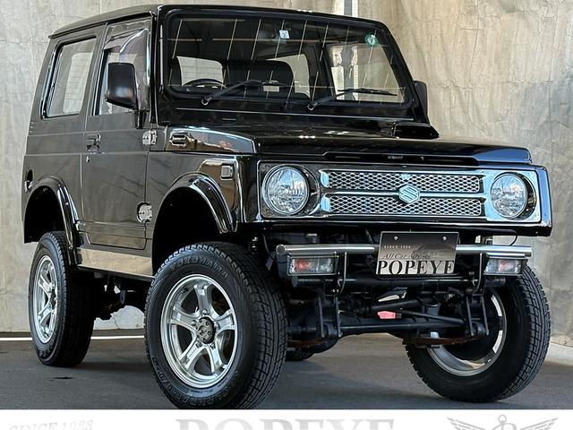 ジムニー HC 全塗装済み V-JA11V改 5MT ターボ 4WD リフトアップ オーバーフェンダー 社外マフラー タニグチリアシートスライドレール MOMOステアリング 社外アルミ 社外足回り 社外シート ETC(3枚目)