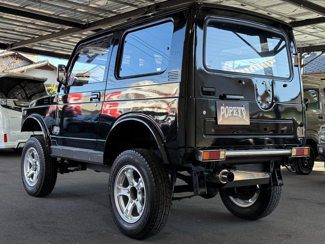 ジムニー HC 全塗装済み V-JA11V改 5MT ターボ 4WD リフトアップ オーバーフェンダー 社外マフラー タニグチリアシートスライドレール MOMOステアリング 社外アルミ 社外足回り 社外シート ETC(6枚目)