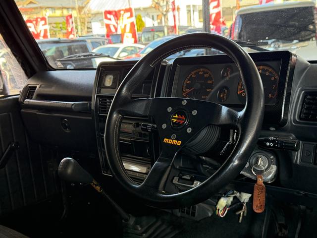 ジムニー HC 全塗装済み V-JA11V改 5MT ターボ 4WD リフトアップ オーバーフェンダー 社外マフラー タニグチリアシートスライドレール MOMOステアリング 社外アルミ 社外足回り 社外シート ETC(22枚目)