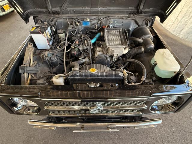 ジムニー HC 全塗装済み V-JA11V改 5MT ターボ 4WD リフトアップ オーバーフェンダー 社外マフラー タニグチリアシートスライドレール MOMOステアリング 社外アルミ 社外足回り 社外シート ETC(57枚目)