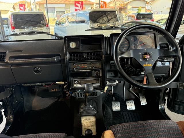 ジムニー HC 全塗装済み V-JA11V改 5MT ターボ 4WD リフトアップ オーバーフェンダー 社外マフラー タニグチリアシートスライドレール MOMOステアリング 社外アルミ 社外足回り 社外シート ETC(69枚目)