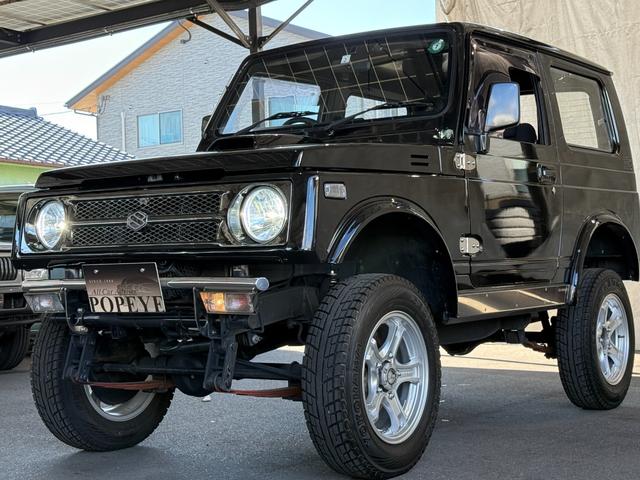 ジムニー HC 全塗装済み V-JA11V改 5MT ターボ 4WD リフトアップ オーバーフェンダー 社外マフラー タニグチリアシートスライドレール MOMOステアリング 社外アルミ 社外足回り 社外シート ETC(77枚目)