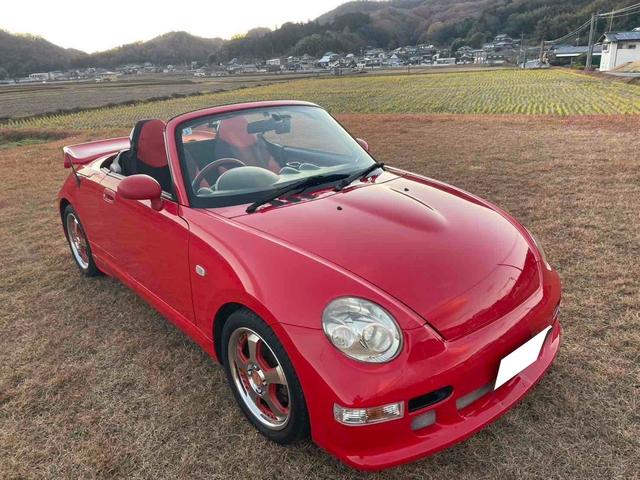 コペン アクティブトップ ターボ 5速MT 電動オープン 社外フロントバンパー 社外リアウイング 社外15インチAW 純正OPエアロスパッツ ETC JB 4気筒エンジン タイミングチェーン ドラレコ前後(4枚目)