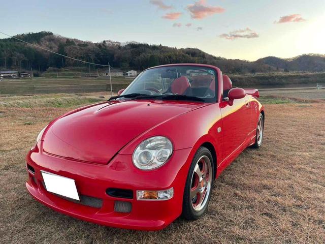 コペン アクティブトップ ターボ 5速MT 電動オープン 社外フロントバンパー 社外リアウイング 社外15インチAW 純正OPエアロスパッツ ETC JB 4気筒エンジン タイミングチェーン ドラレコ前後(10枚目)