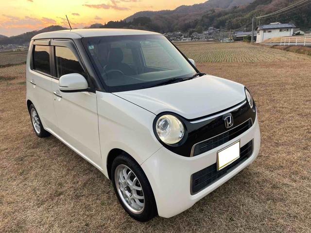 N-ONE G・Lパッケージ ディーラー下取り車 社外15インチAW フルセグナビ TV Bluetoothオーディオ バックカメラ ビルトインETC 社外シートカバー ステアリングリモコン リトラミラー スマートキー2個(4枚目)