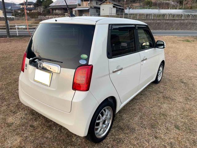 N-ONE G・Lパッケージ ディーラー下取り車 社外15インチAW フルセグナビ TV Bluetoothオーディオ バックカメラ ビルトインETC 社外シートカバー ステアリングリモコン リトラミラー スマートキー2個(5枚目)