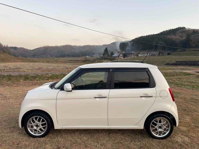 N-ONE G・Lパッケージ ディーラー下取り車 社外15インチAW フルセグナビ TV Bluetoothオーディオ バックカメラ ビルトインETC 社外シートカバー ステアリングリモコン リトラミラー スマートキー2個(7枚目)