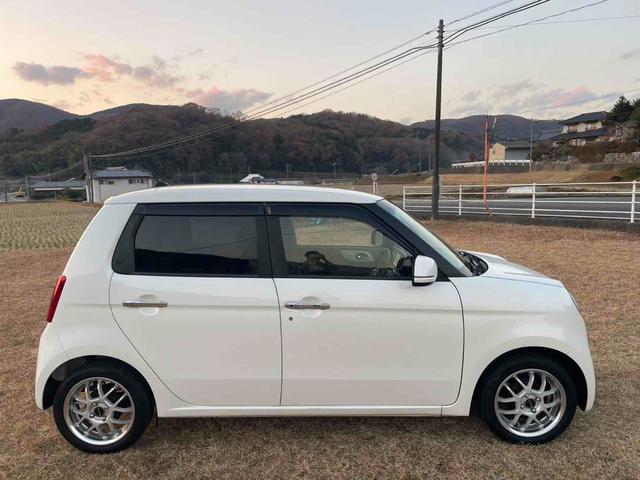 N-ONE G・Lパッケージ ディーラー下取り車 社外15インチAW フルセグナビ TV Bluetoothオーディオ バックカメラ ビルトインETC 社外シートカバー ステアリングリモコン リトラミラー スマートキー2個(8枚目)