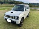 ジムニー ランドベンチャー　特別仕様車　ターボ　４ＷＤ　メッキグリル　専用シート　ゲート式ＡＴ　純正１６インチＡＷ　ナビ　ＴＶ　ＥＴＣ　記録簿　シートヒーター　切り替えボタン式４ＷＤ　改良型モデル　ドラレコ前後　７型後期（3枚目）