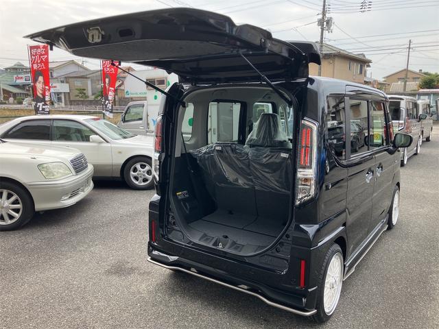 スペーシアカスタム ハイブリッドＸＳターボ　届出済未使用車・禁煙車・ブラック・　社外１６インチアルミホイール／タイヤ　ローダウン　フロント／サイド／リア　フラップスポイラー　両側電動スライドドア　クリアランスソナー　オートクルーズコントロール　オートライト　ＬＥＤヘッドランプ（45枚目）